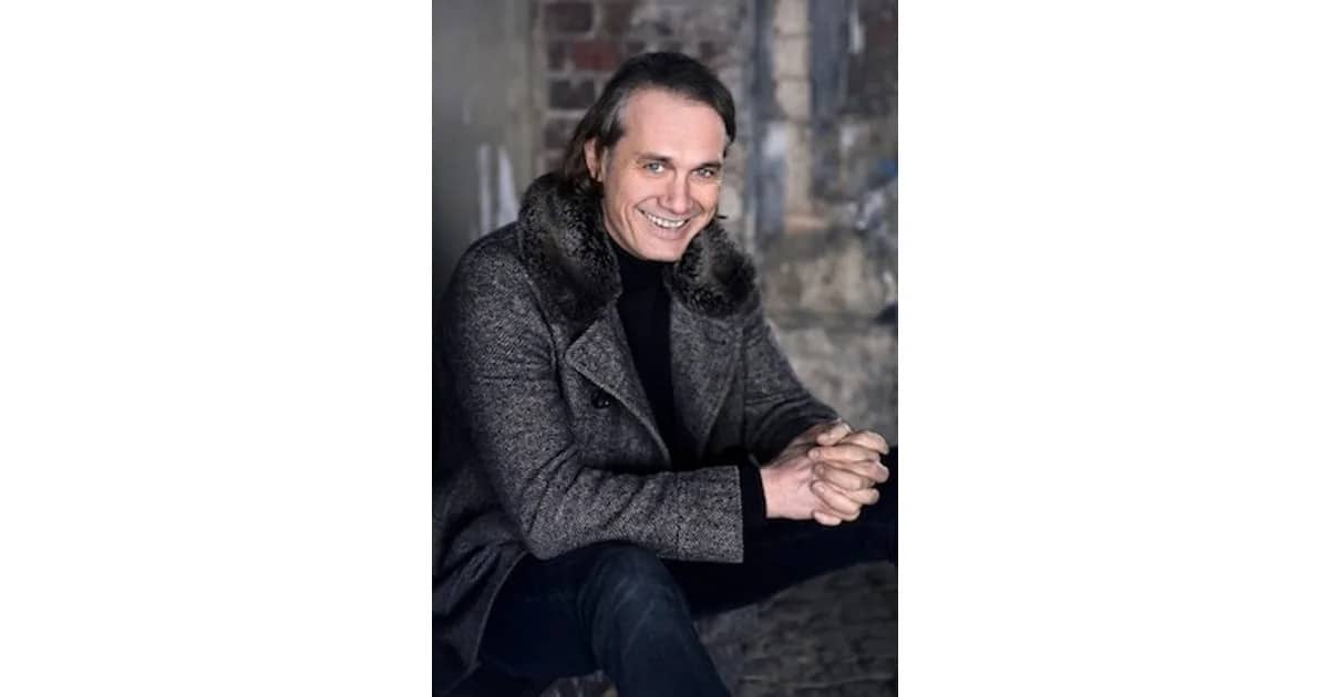 Das Lächeln am Fuße der Leiter - Ralf Bauer