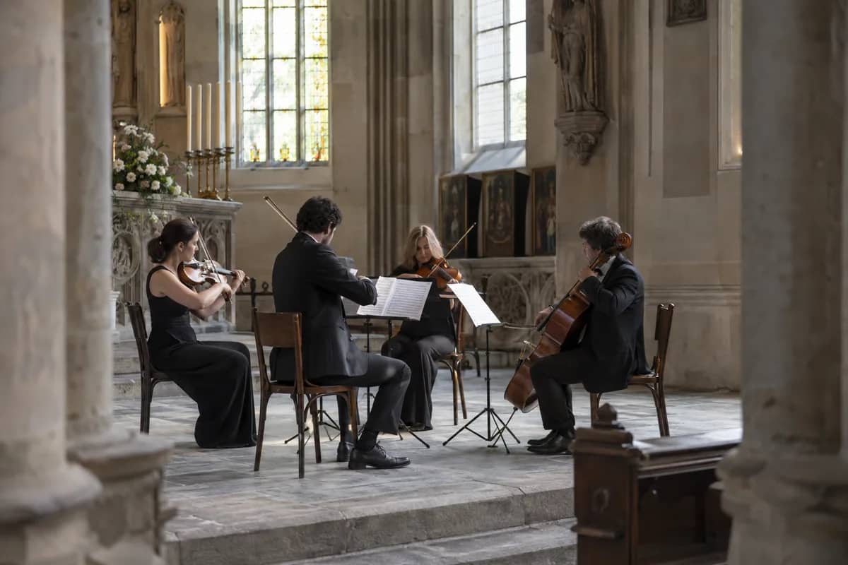 AI-generated illustration String quartet performing in a stone church — AI-generated illustration